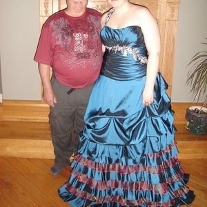 Blue and pink prom dress. This is a corset back dress can fit 12-18.